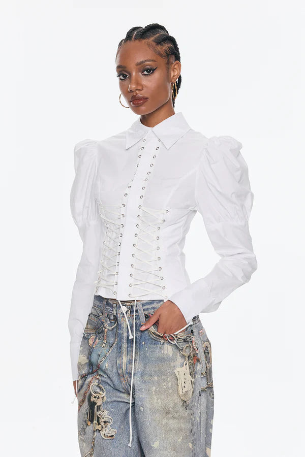 Top con mangas abullonadas y ajuste con cordones