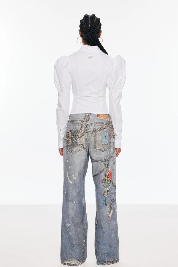 Top con mangas abullonadas y ajuste con cordones